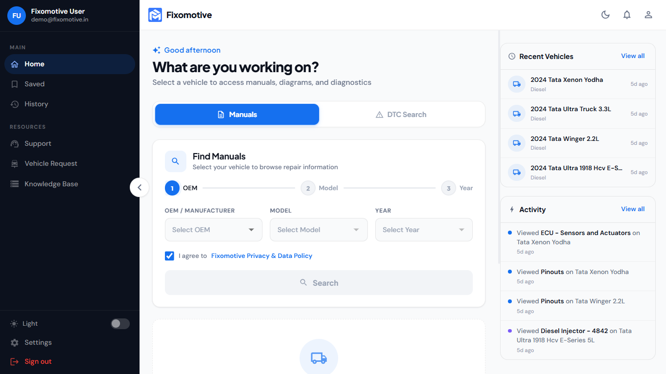Fixomotive automotive repair software home dashboard featuring vehicle manual search and DTC diagnostic data tools for commercial trucks and cars.